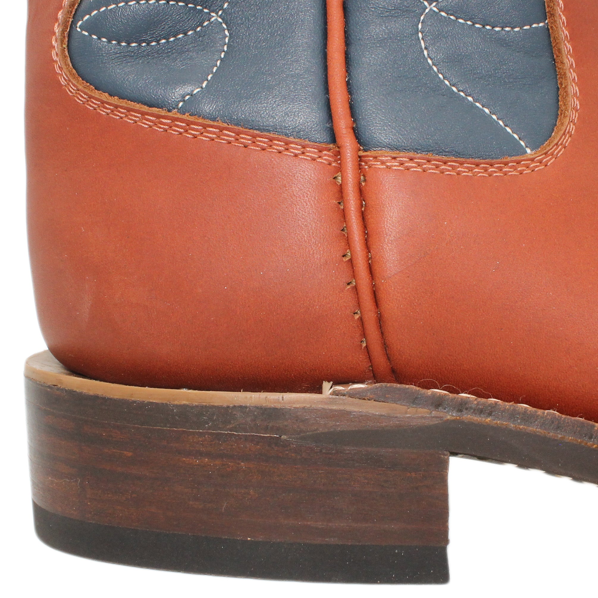 12" Blue Upper w/ Loops Stitching
Tan Timberjack Steer Vamp
Round Toe
Block Heel