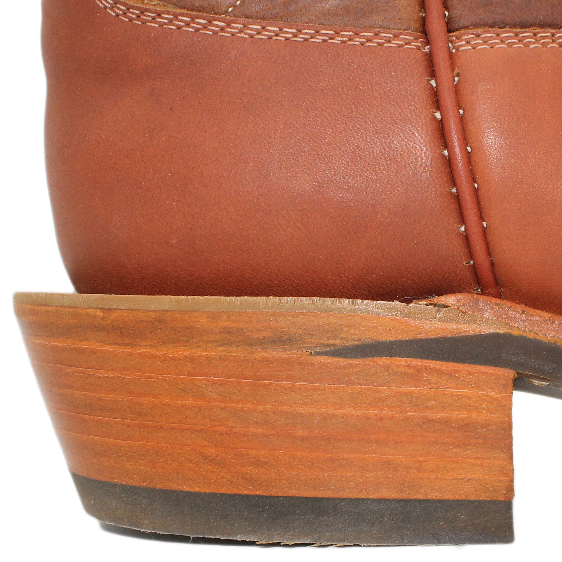 12" Brown Upper w/ Loops Stitching
Tan Timberjack Steer Vamp
Regular French Square Toe
Slightly Tapered Heel