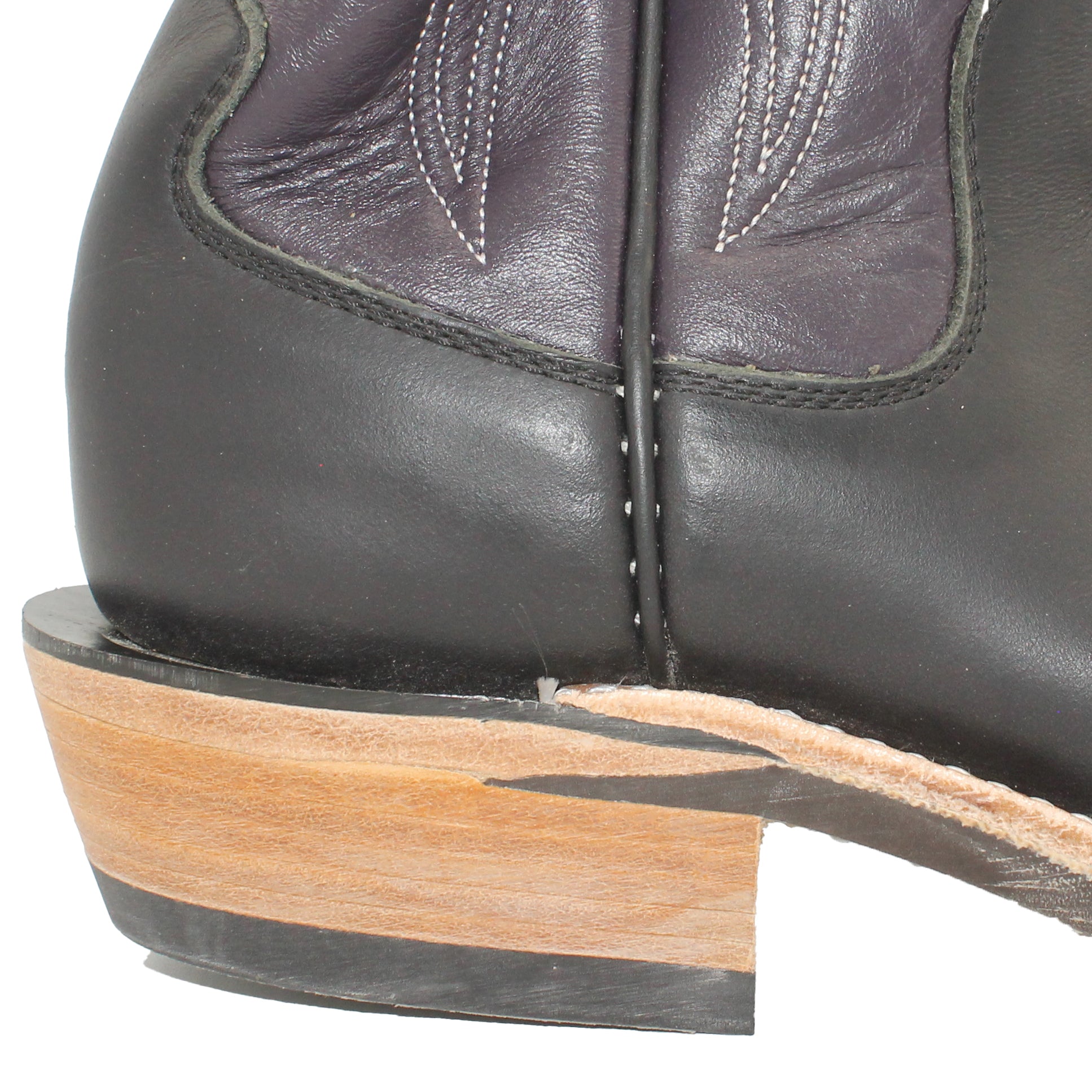 16" Purple Upper w/ Tulip Stitching
Black Steer Vamp
Wide French Square Toe
Slightly Tapered Heel