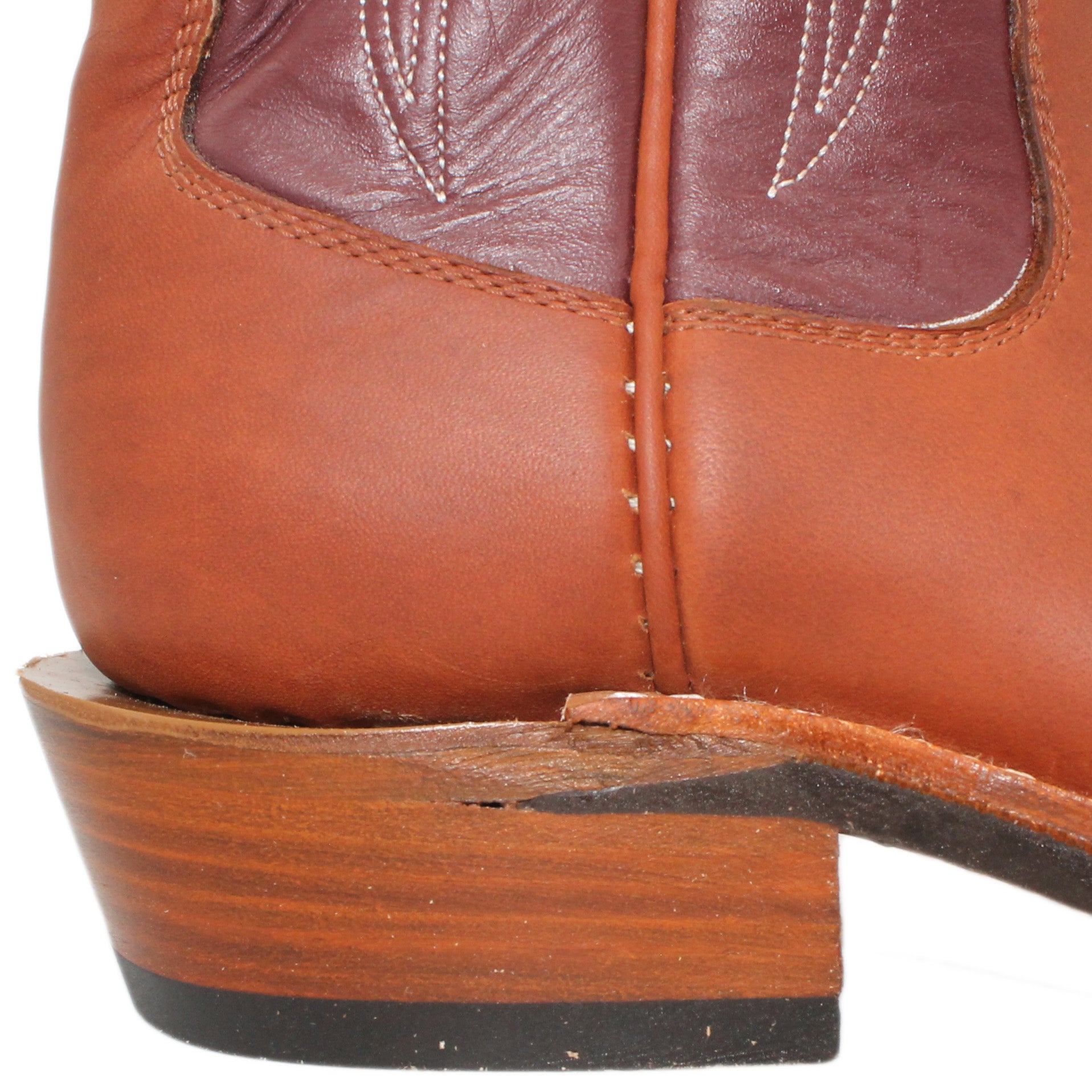 16" Wine Uppers w/ Tulip Stitching
Tan Timberjack Steer Vamp
Wide French Square Toe
Slightly Tapered Heel