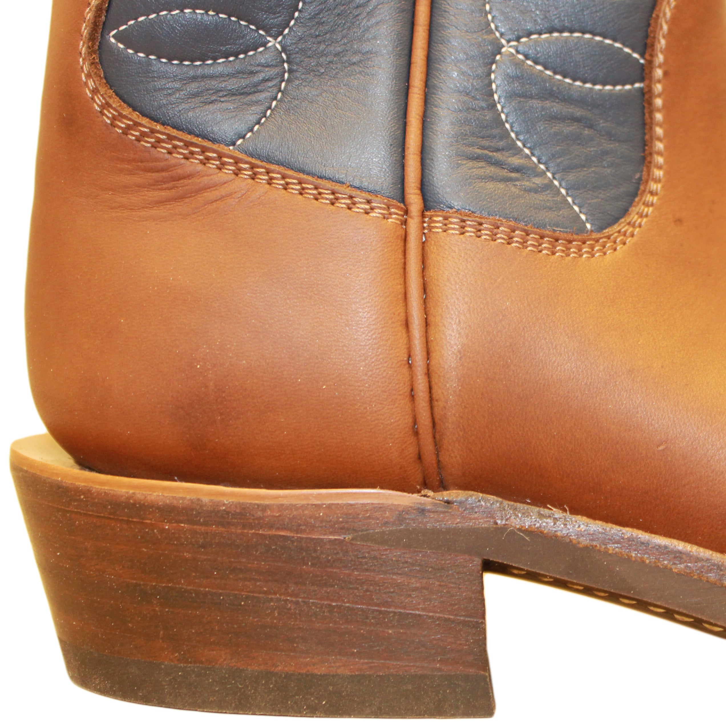 12" Blue Upper w/ Loops Stitching
Saddle Timberjack Steer Vamp
Wide French Square Toe
Slightly Tapered Heel