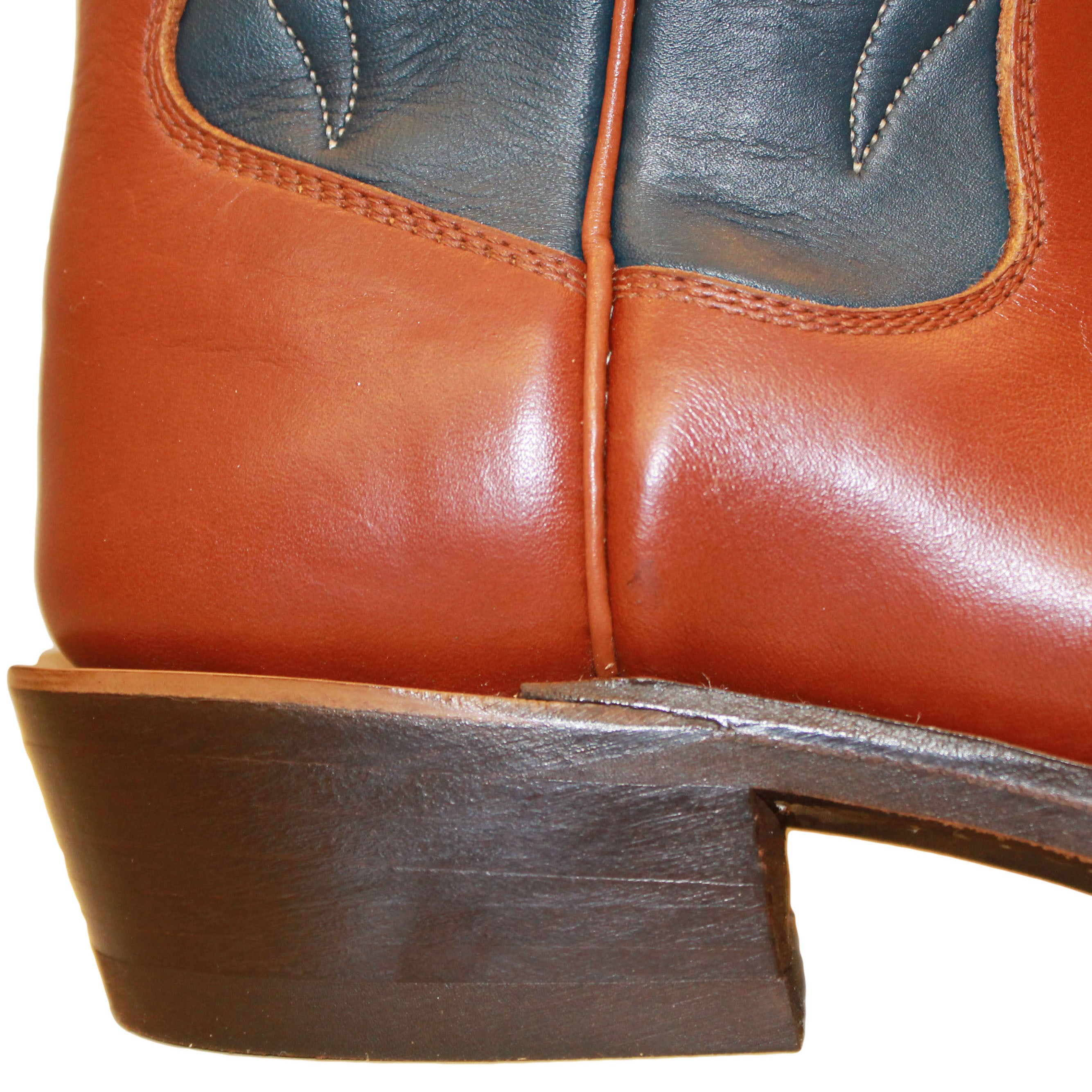14" Blue upper w/ Beck Classic Stitching
Tan Timberjack Steer Vamp
Wide French Square Toe
Slightly Tapered Heel