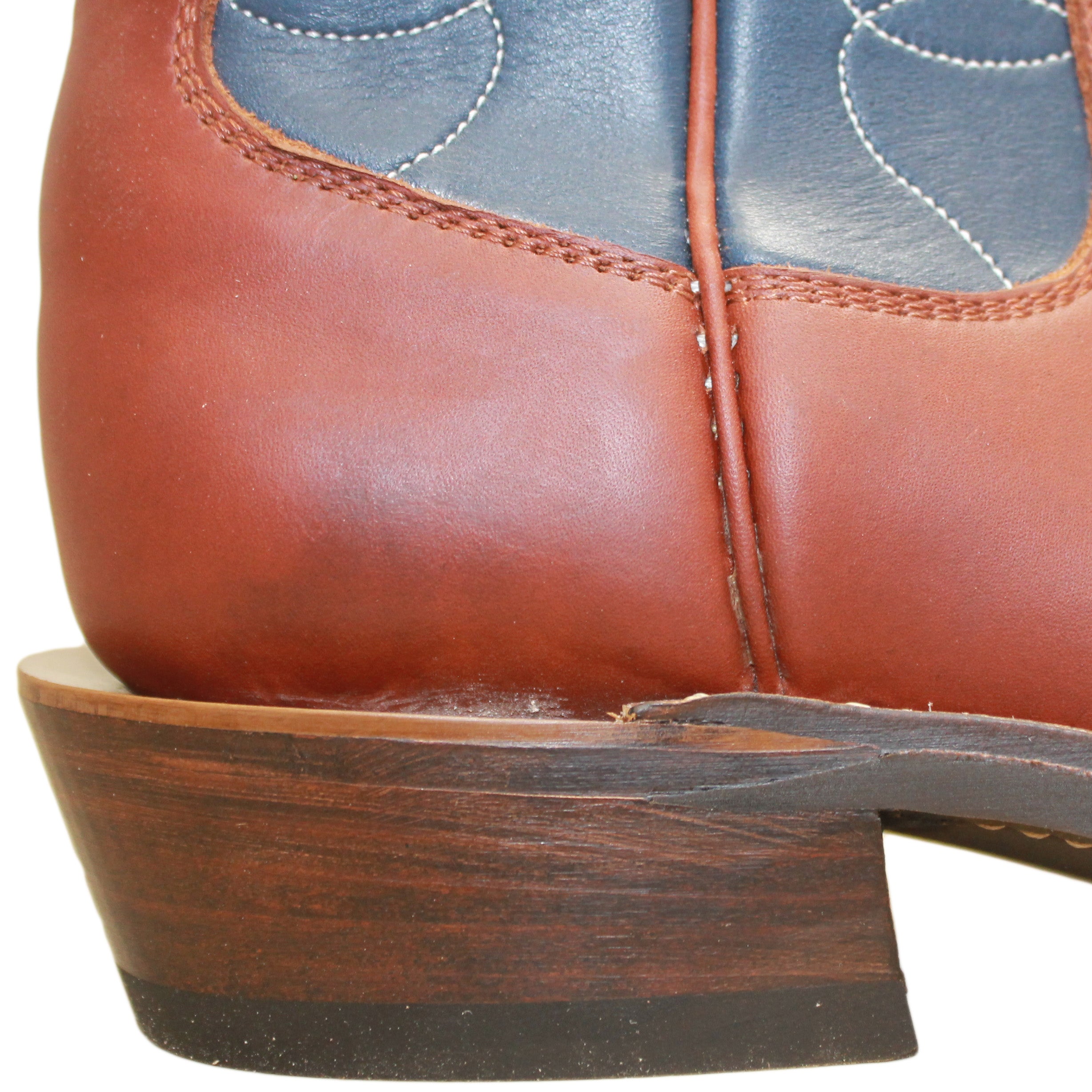 12" Blue Upper w/ Loops Stitching
Tan Timberjack Steer Vamp
Wide French Square Toe
Slightly Tapered Heel