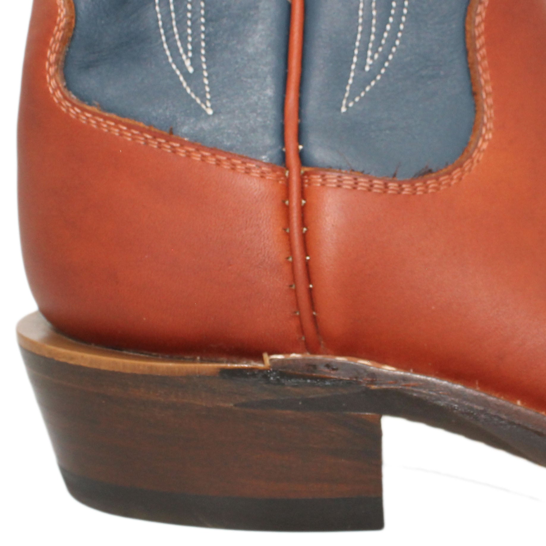 16" Blue Upper w/ Tulip Stitching
Tan Timberjack Steer Vamp
Wide French Square Toe
Slightly Tapered Heel