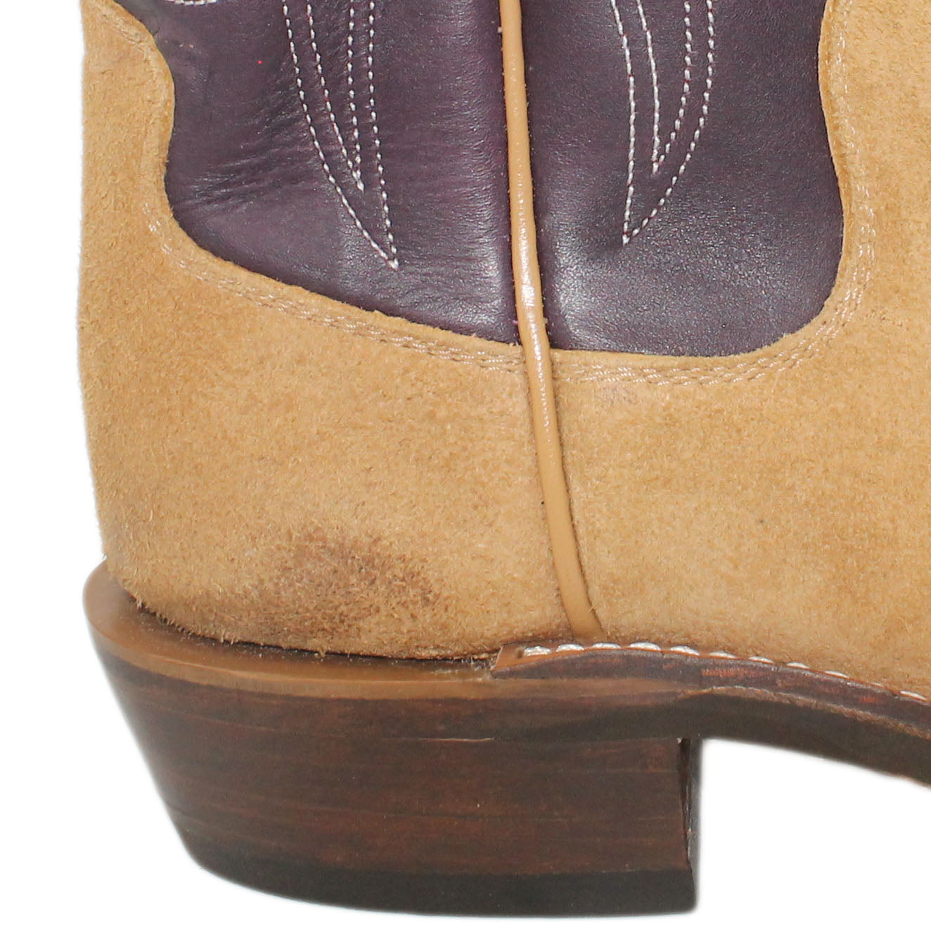 16" Purple Uppers w/ Tulip Stitching
Buckskin Rough Out Steer Vamp
Wide French Square Toe
Slightly Tapered Heel