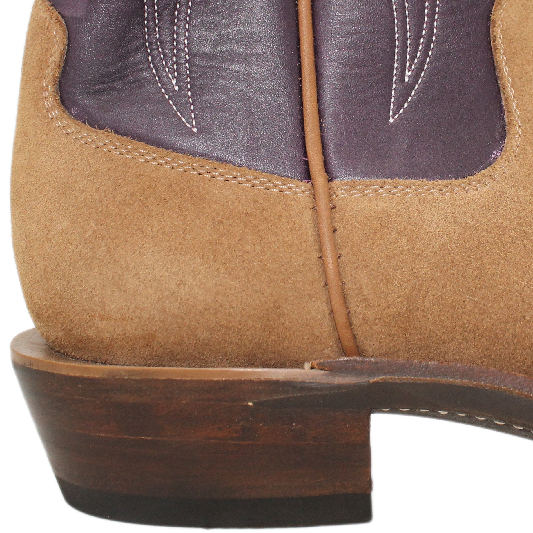 16" Purple Upper w/ Tulip Stitching
Saddle Timberjack Rough Out Steer Vamp
Regular French Square Toe
Slightly Tapered Heel