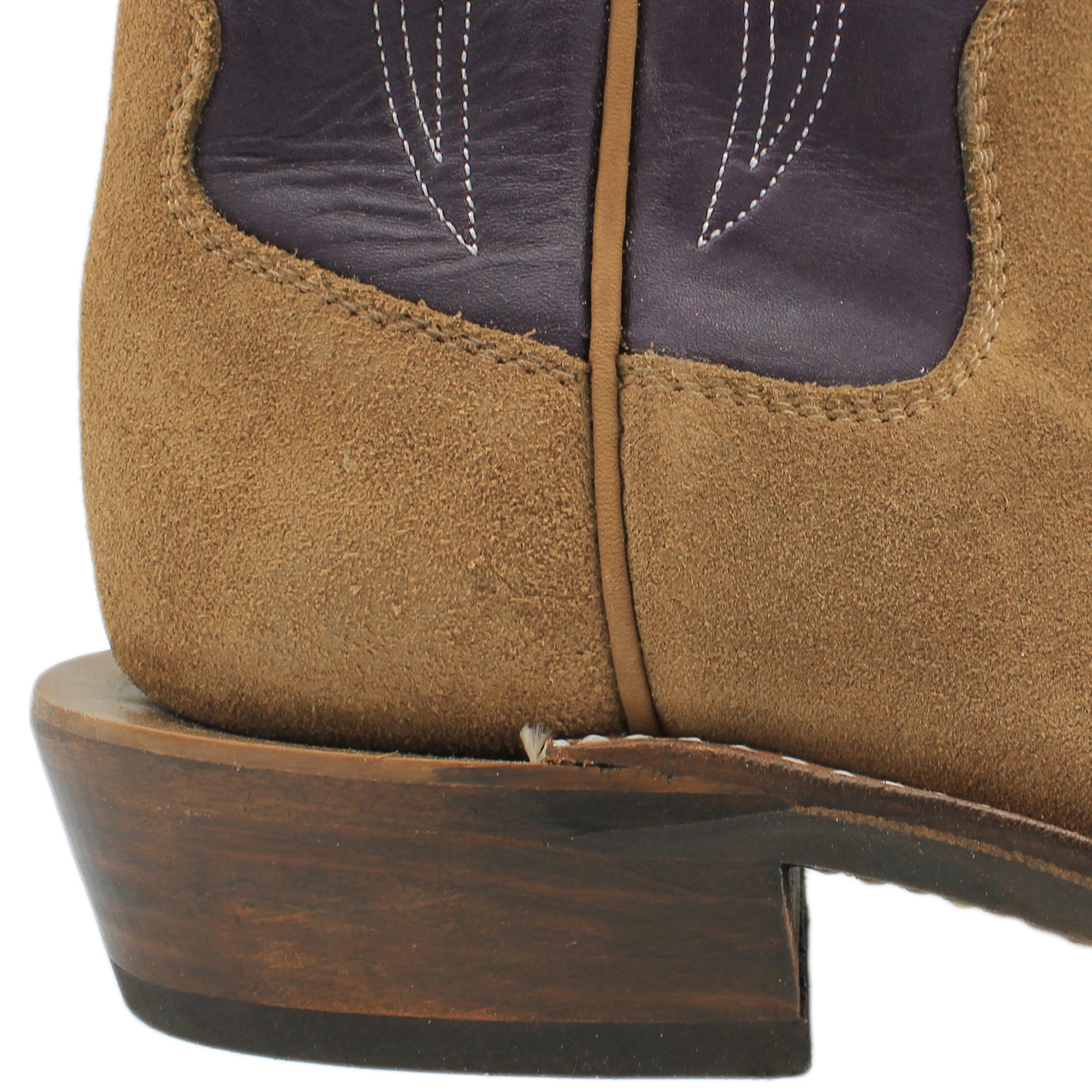 16" Purple Upper w/ Tulip Stitching
Saddle Timberjack Rough Out Steer Vamp
Wide French Square Toe
Slightly Tapered Heel
