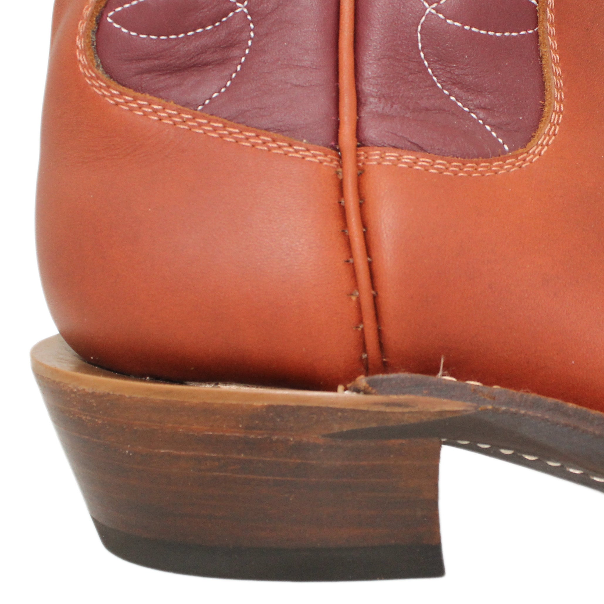12" Wine Upper w/ Loops Stitching
Tan Timberjack Steer Vamp
Wide French Square Toe
Slightly Tapered Heel