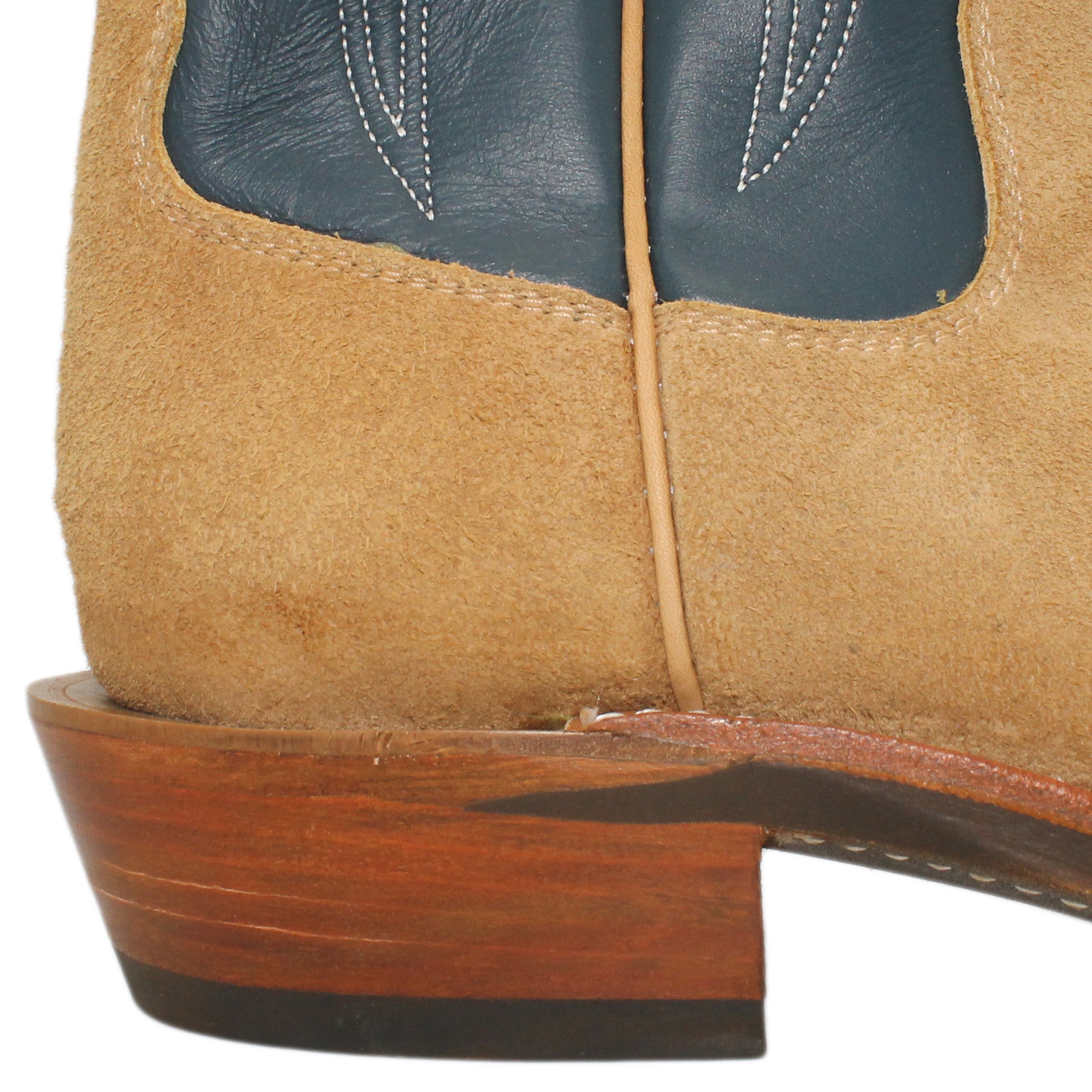 16" Blue Uppers w/ Tulip Stitching

Buckskin Rough Out Steer Vamp

Regular French Square Toe

Slightly Tapered Heel