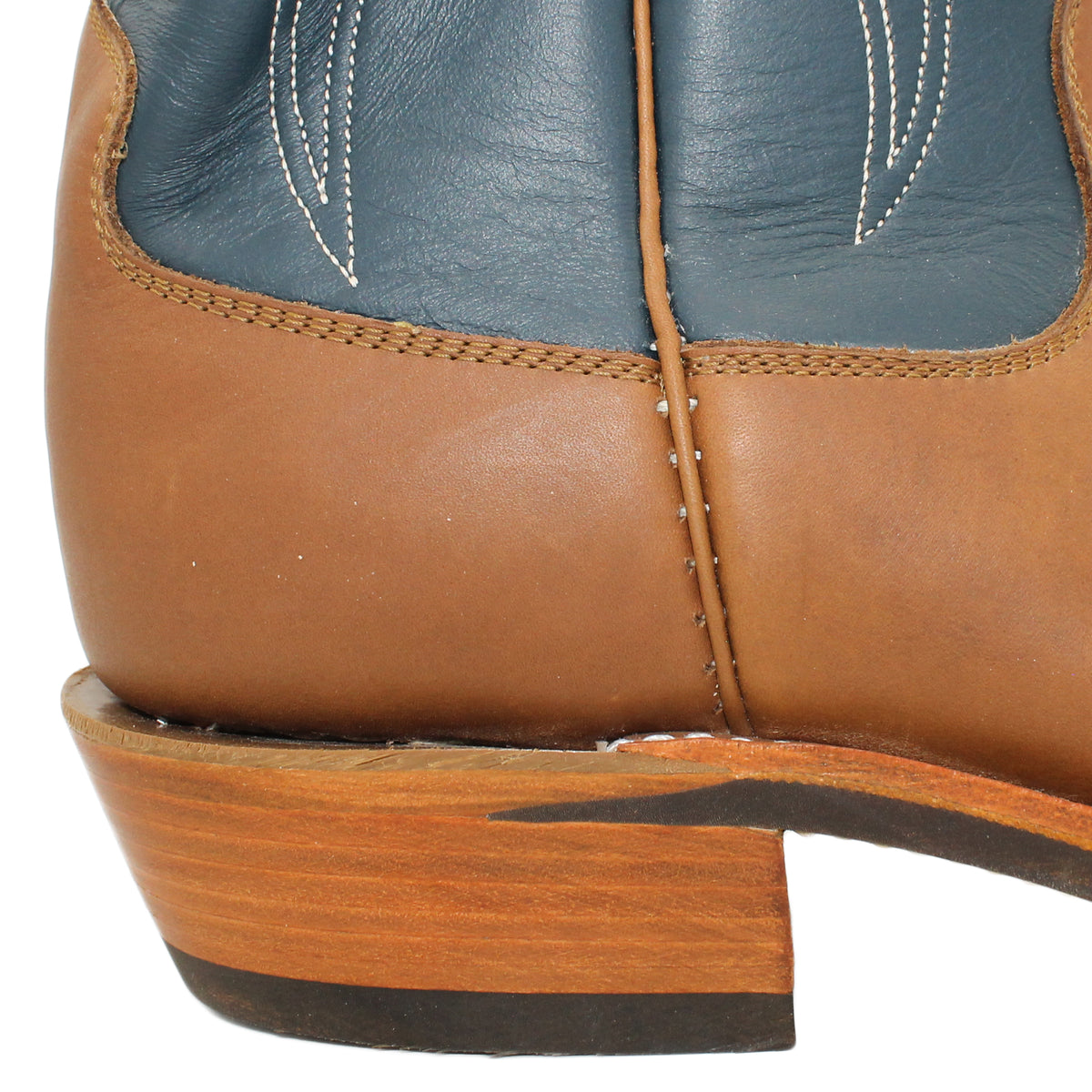 16" Blue Uppers w/ Tulip Stitching

Saddle Timberjack Steer Vamp

Wide French Square Toe

Slightly Tapered Heel
