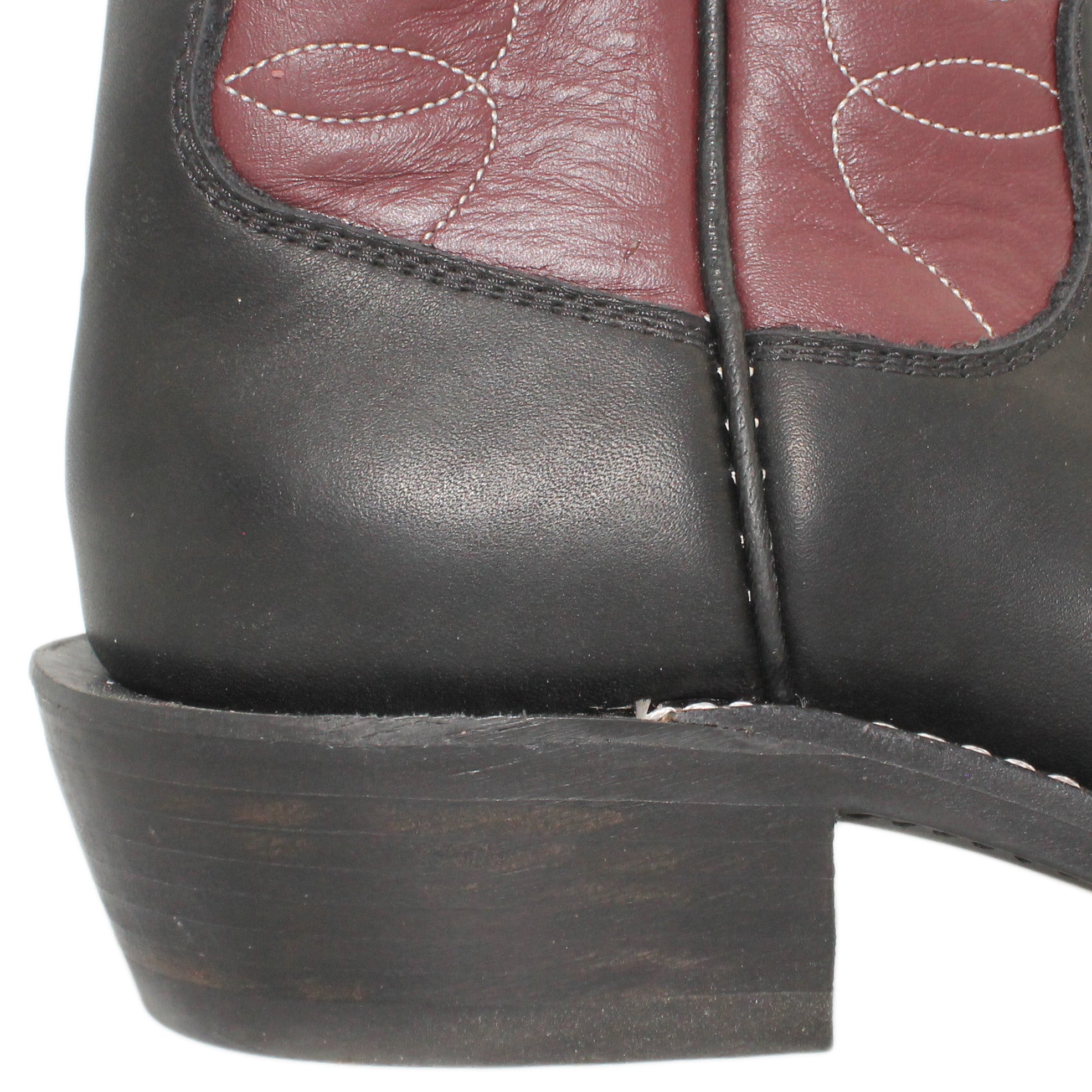 12" Wine Upper w/ Loops Stitching

Black Steer Vamp

Regular French Toe

Slightly Tapered Heel

Leather Sole