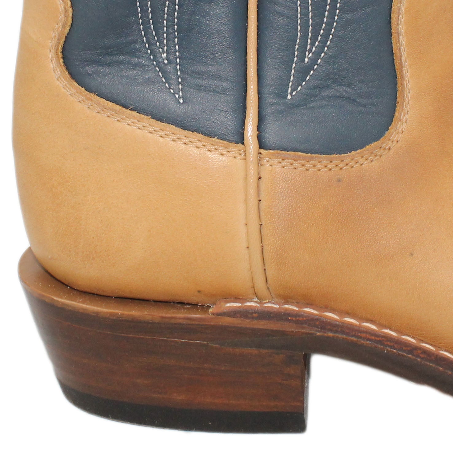 16" Blue Uppers w/ Tulip Stitching

Buckskin Steer Vamp

Wide French Square Toe

Slightly Tapered Heel