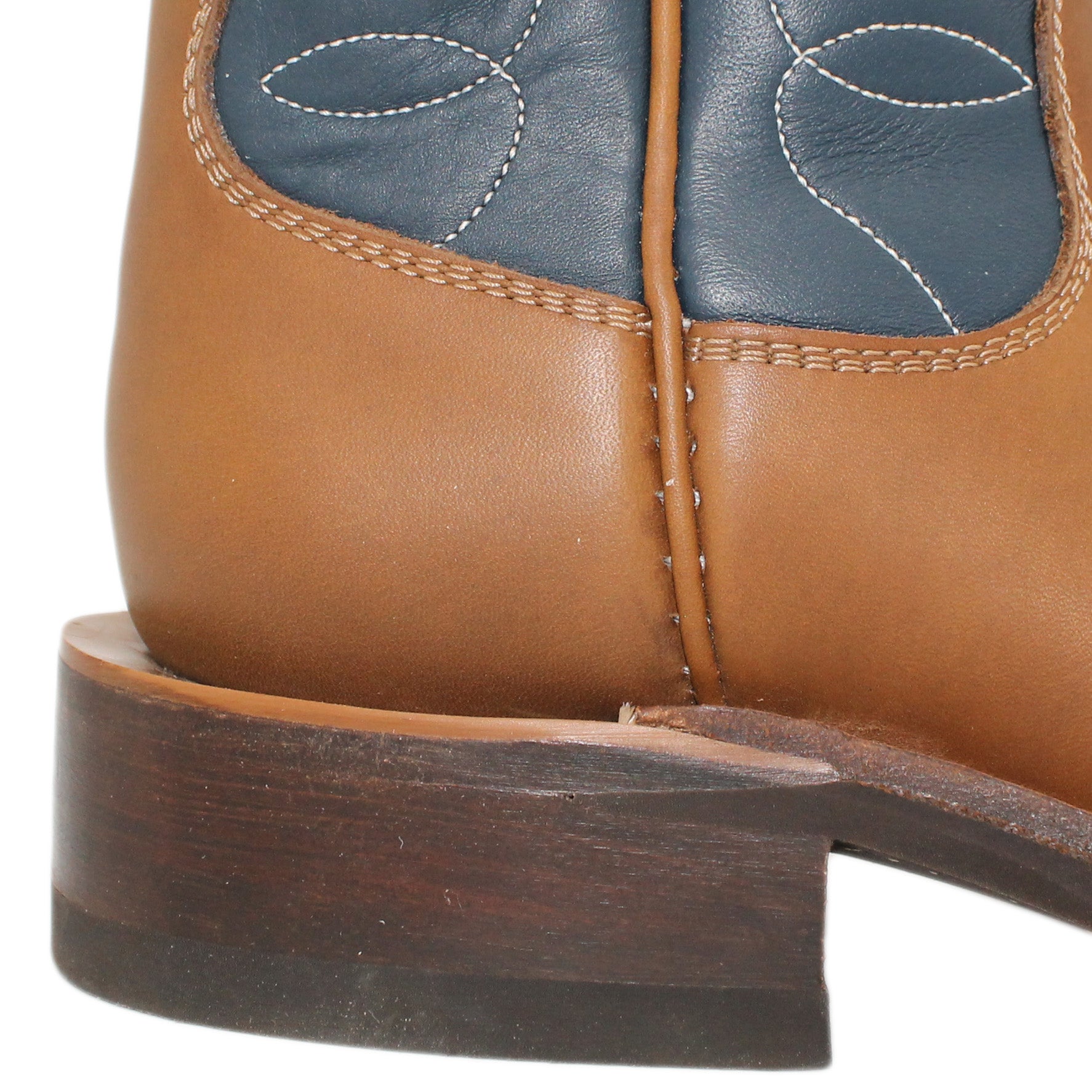 12" Blue Upper w/ Loops Stitching

Saddle Timberjack Steer Vamp

Wide French Square Toe

Block Heel