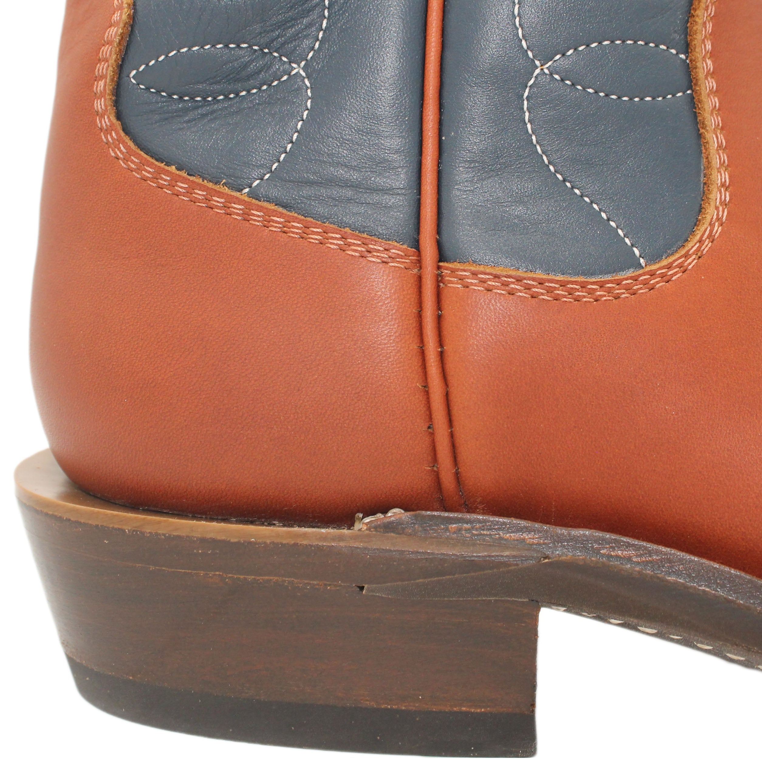 12" Blue Upper w/ Loops Stitching

Tan Timberjack Steer Vamp

Regular French Square Toe

Slightly Tapered Heel 